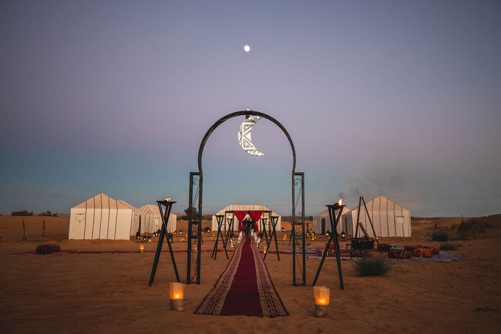 The moon-arch entrance to Tiziri Camp