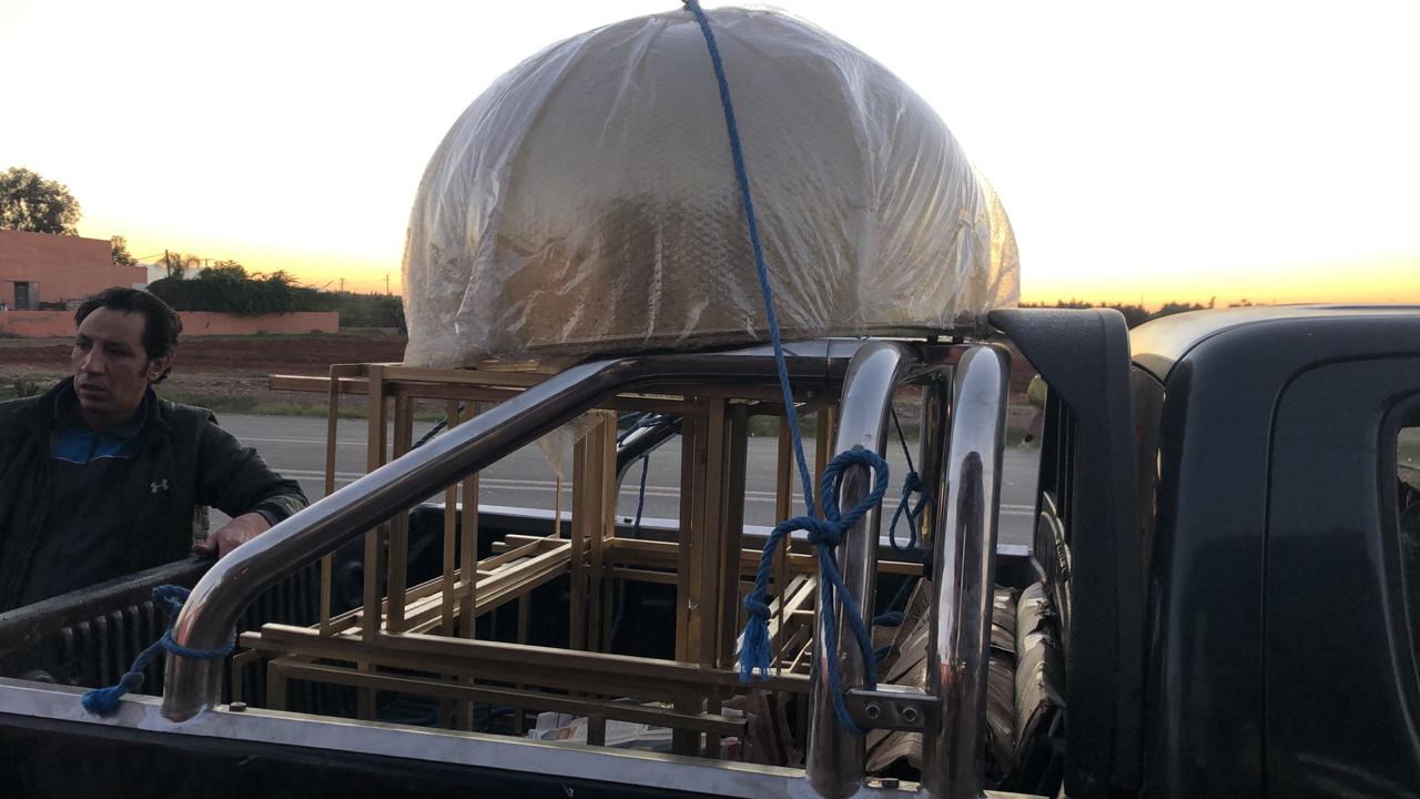 Transporting the huge restaurant light shade